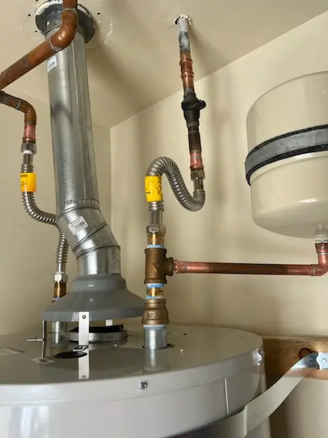 Water heater installation and plumbing repair in Chimney Trace